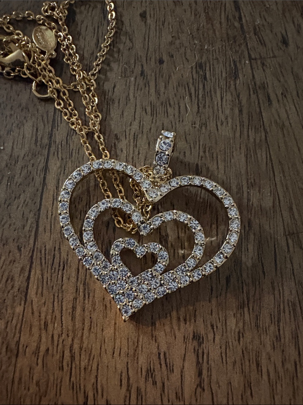 Nolan Miller Gold-Tone Triple Heart Pendant Necklace with Clear Stones
